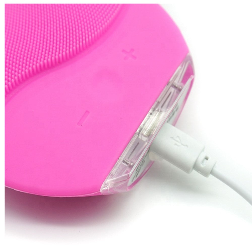 Nettoyant et masseur pour le visage