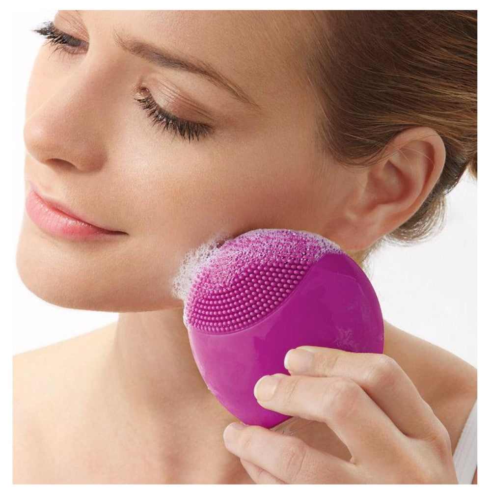 Nettoyant et masseur pour le visage